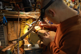 Free-hand carving the year and net number Free-hand carving the year and net number